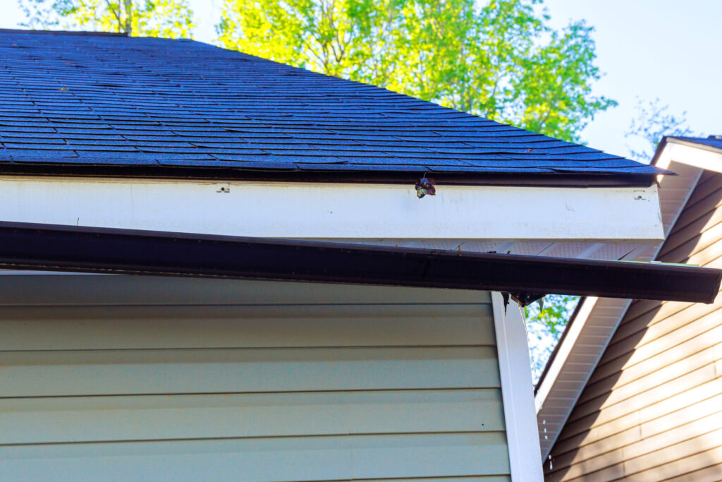 Broken gutter system on a residential roof