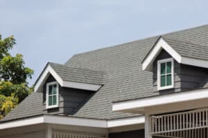 a newly installed roof with brand new asphalt shingles